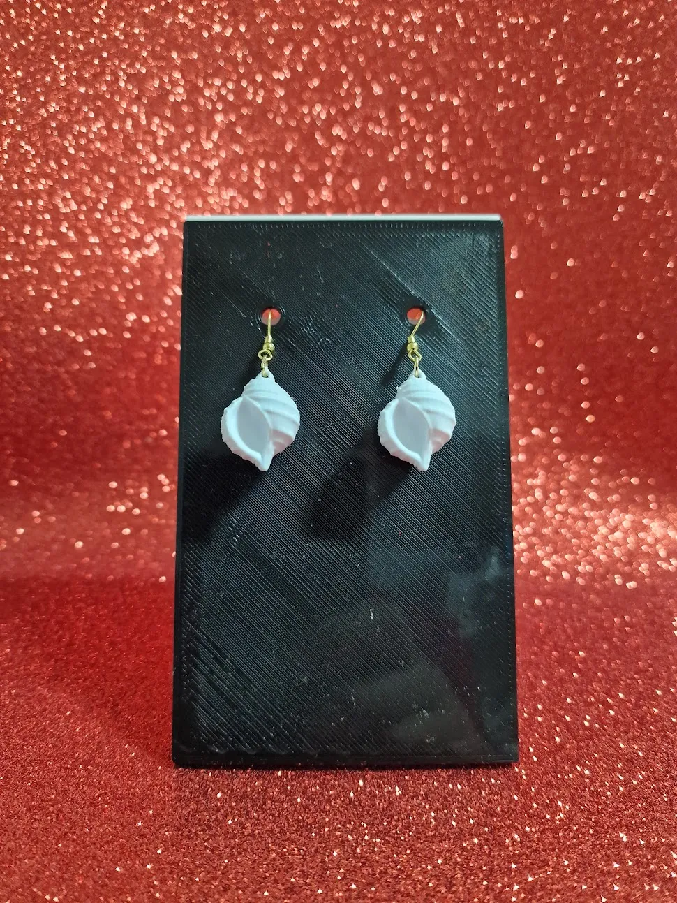 Spiral shell earrings view 2