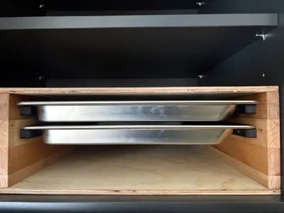 Baking tray rails for wooden shelf