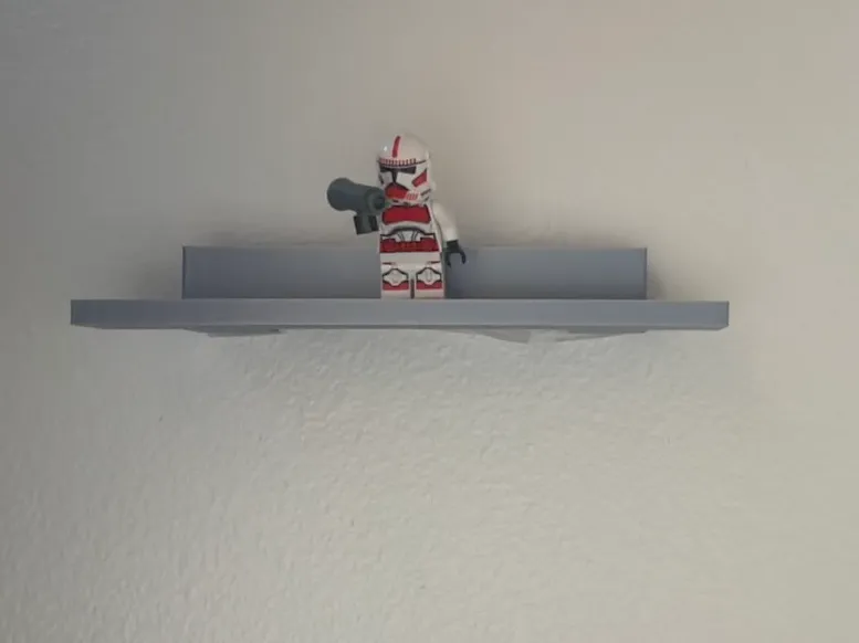 Wall mount for minifig