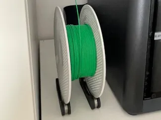 Filament roll holder
