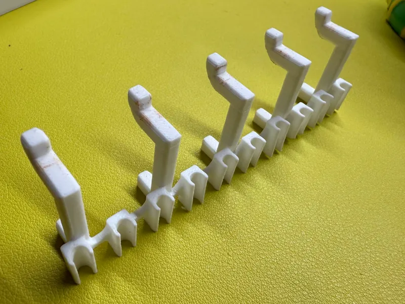 Pegboard PTFE Tube Holder