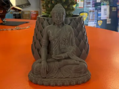 Vase with meditating Buddha