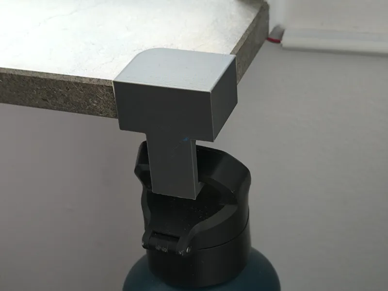 Window sill water bottle holder