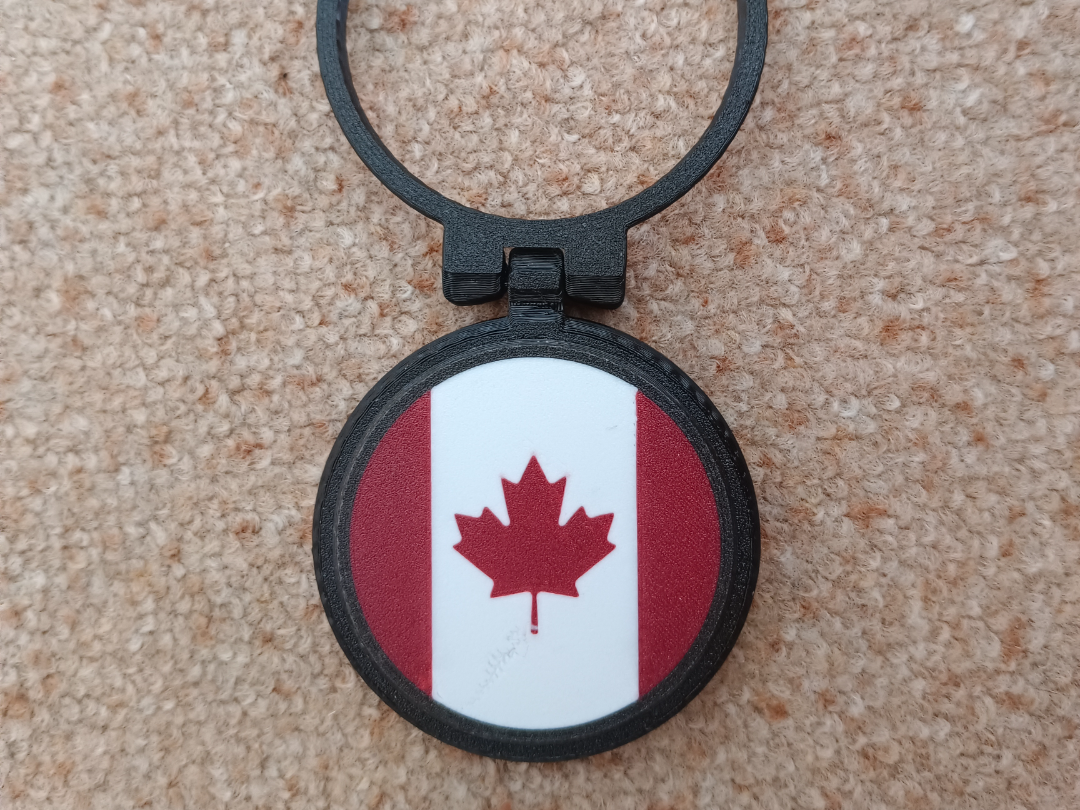 removable Canada emblem to lid metal cans