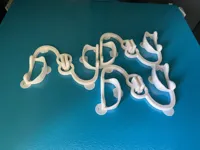 103% increase, 0.2mm layer, 5 walls, 15% infill, brim ears