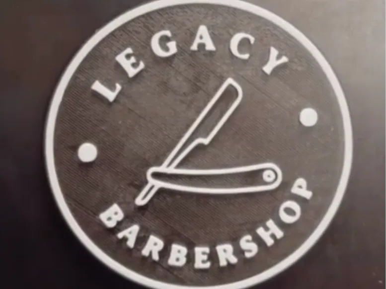 Legacy Barbershop logo con calamita interna