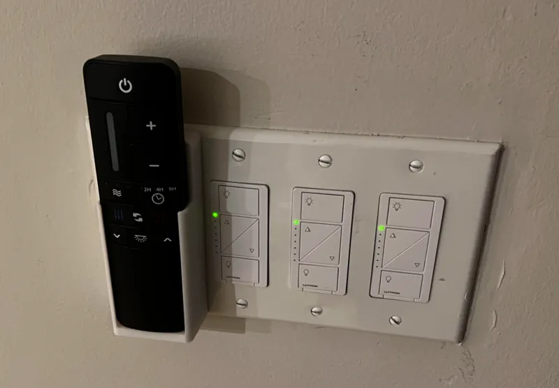 Ceiling fan holder for wall plate