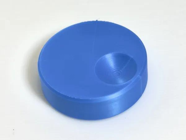 Capuchon rotatif pour circuit à billes courbe de Hilbert