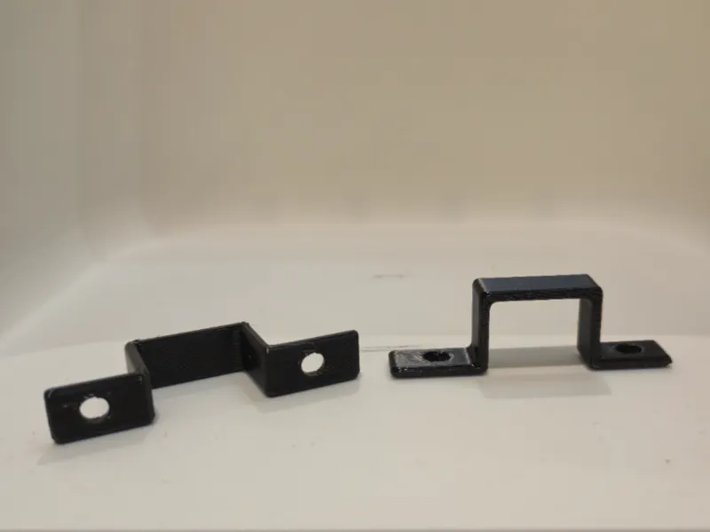 Single hook with two screw fixings