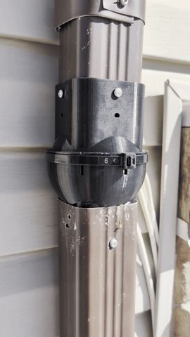Square rain gutter downspout rotation attachment