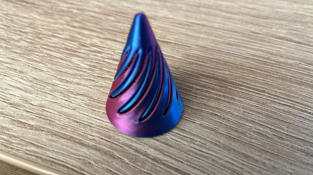 Spiral spinning cone fidget toy - Free 3D Print Model - MakerWorld