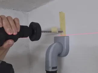 Universal handsfree wall drilling adapter
