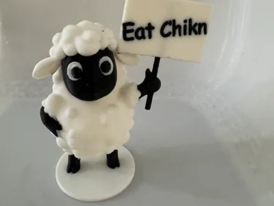 Sheep with funny sign