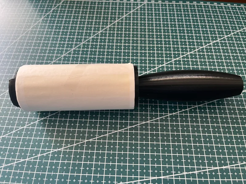 support rouleau adhésif pour brosse à habits