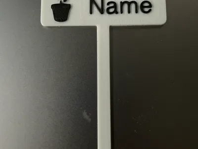 Customizable plant name plate.