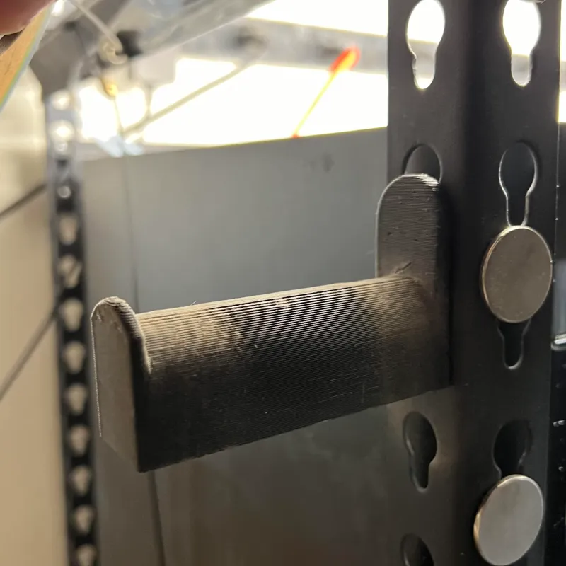 Spool holder for metal shelves
