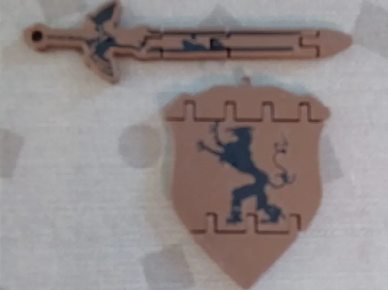 The flexi shield and sword keychain