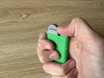 Objeto manipulable: Ratchet Lighter FIdget — vista de referencia 4