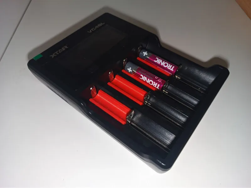 Charger insert for AA and AAA batteries