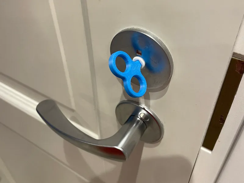 Toilet door lock key