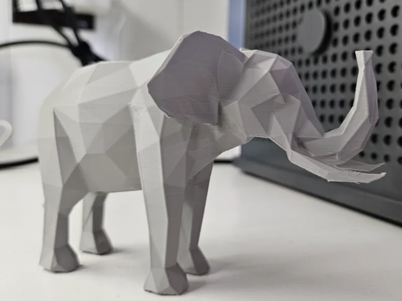 Standing Low Poly Elephant with trunk up