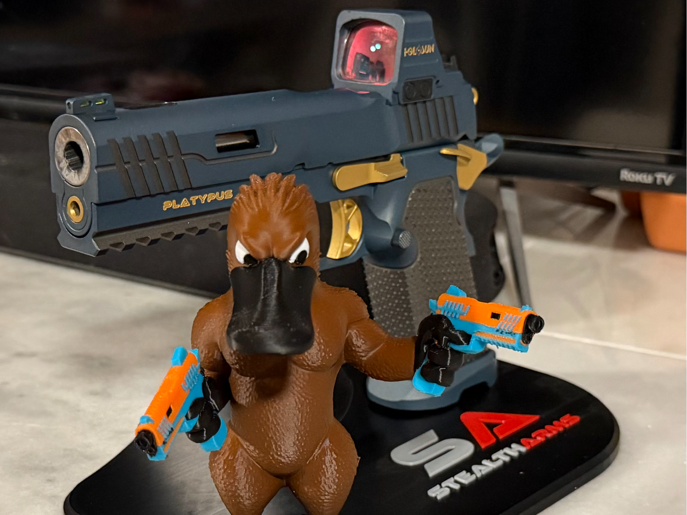 StealtArms Pistol Stand with Perry the Platypus