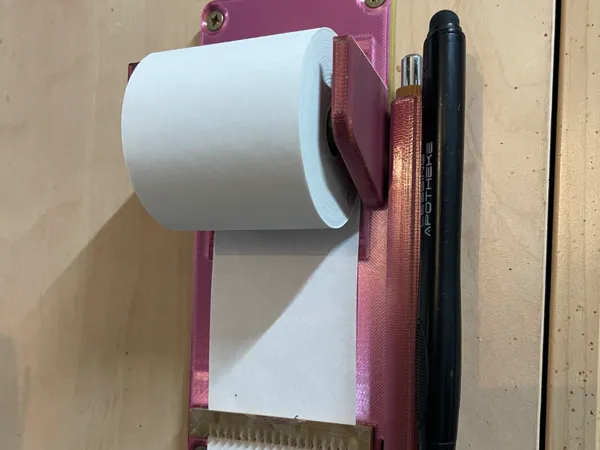 Porte-rouleau de papier avec coupe intégrée