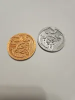 Celtic dragon symbol coin, debossed, no ridges