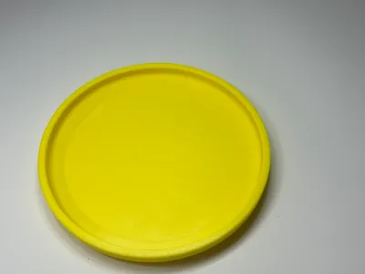 Miniature Frisbee (long range flying disk)