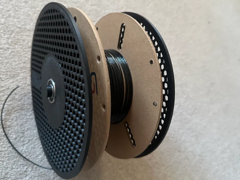 Low friction spool adapter