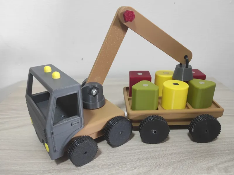 Camion con braccio articolato magnetico