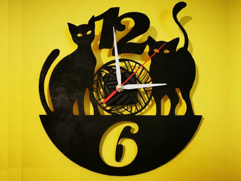 Cats and balls of yarn design wall clock
