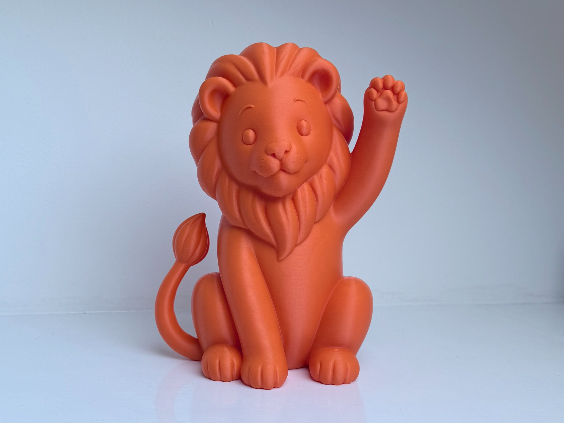 Cute waving lion