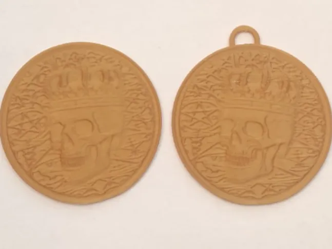 skull relief coin