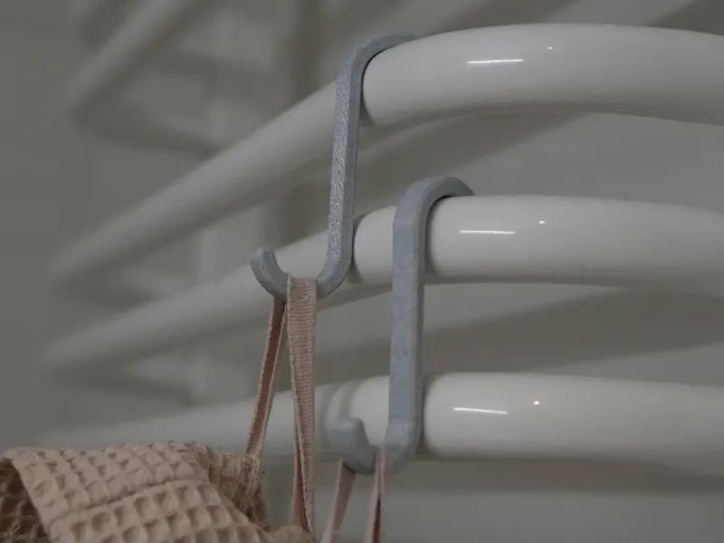 Simple hanger for bathroom heater's 20mm tubing. 