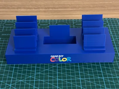 Game Boy Color and 8 cartridges holder