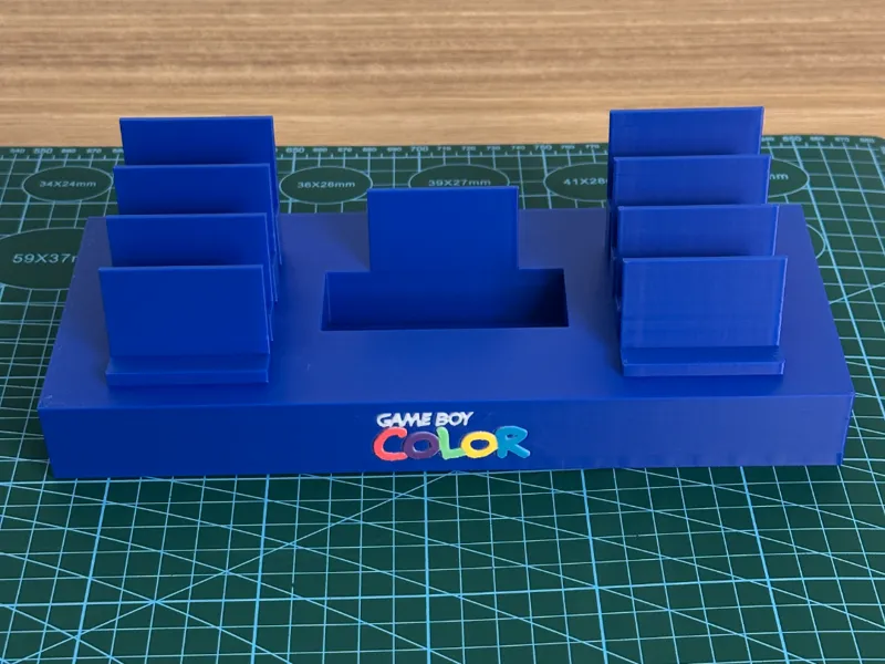Soporte GameBoy Color y 8 cartuchos