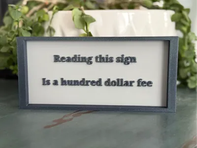 Comedy 100$ fee sign
