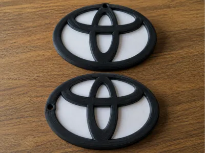 toyota logo with hole for keychain