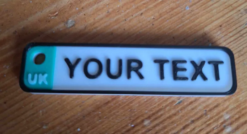 Editable licence plate keychain