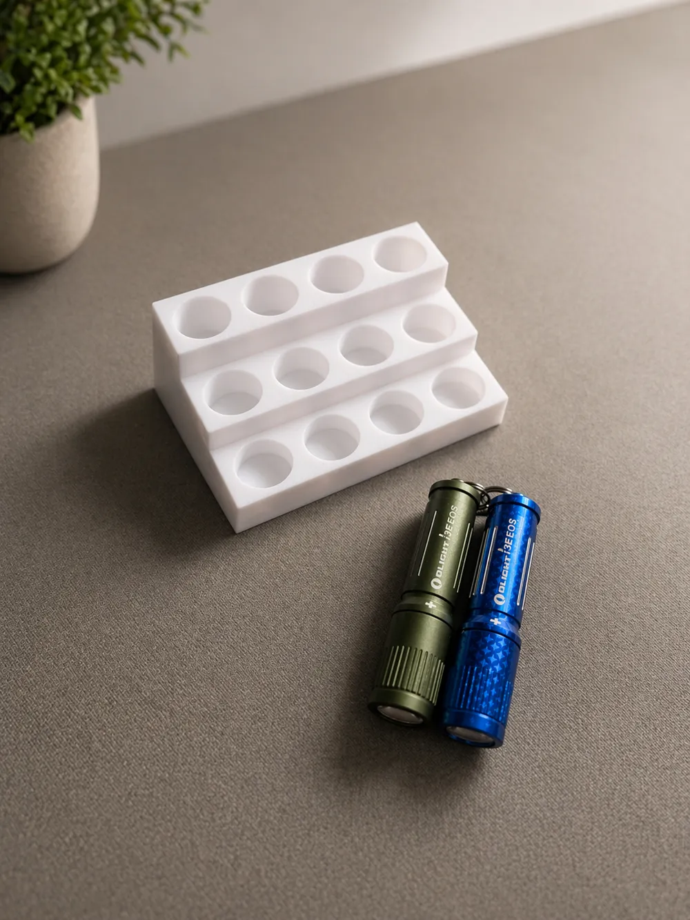 Olight torch display stand - i3E EOS - Free 3D Print Model - MakerWorld