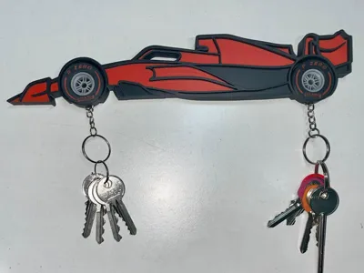 Formula 1 silhouette wall mount + pirelli keychain