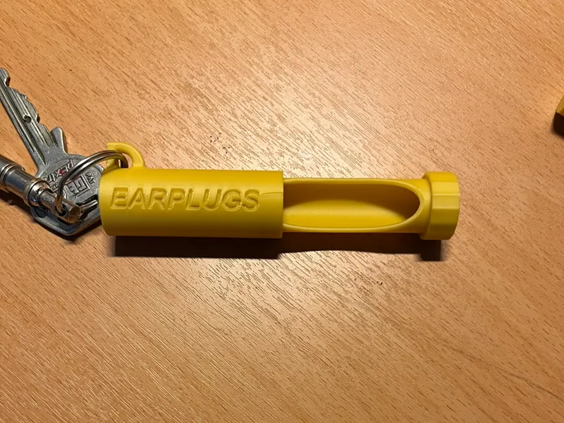 Earplug case for keychain (english text)