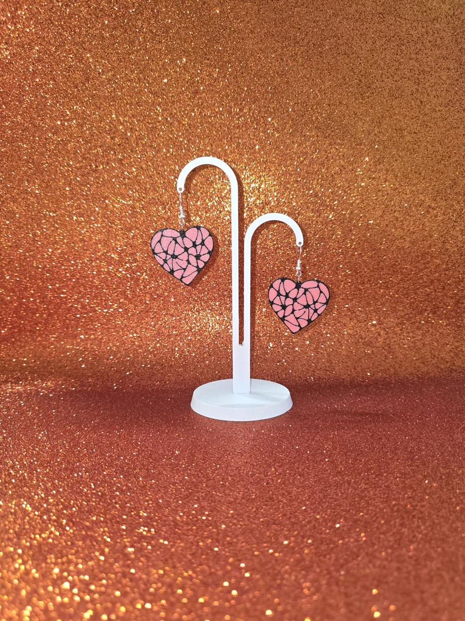 Segmented heart earrings view 3
