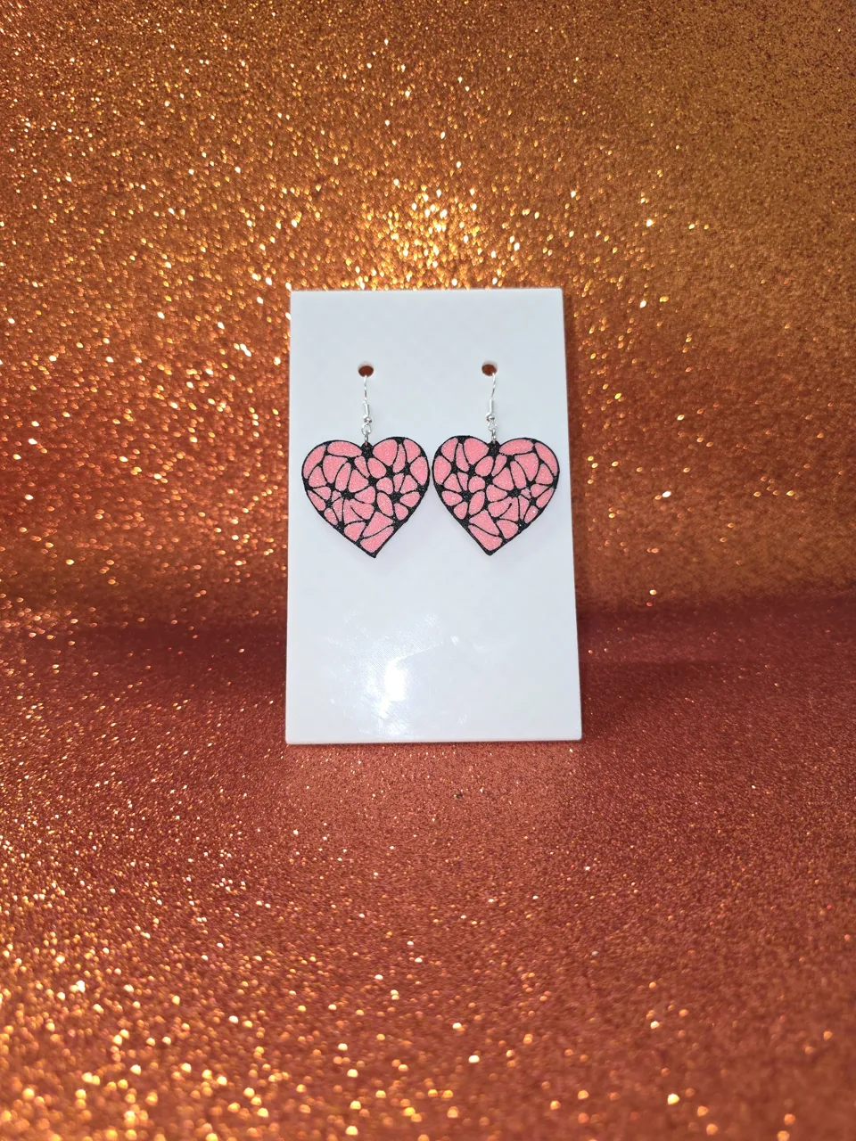 Segmented heart earrings view 2