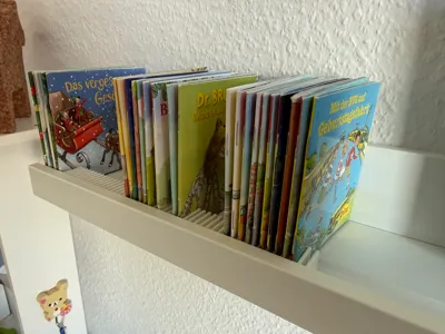 Clean Pixi book holder for Ikea Mosslanda shelf