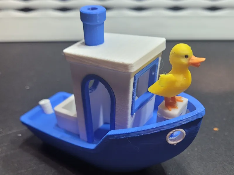 Ducky on a Benchy