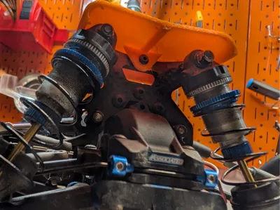 RC10B84 Front Shock Tower Cover
