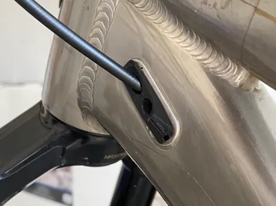 Banshee Rune V3 internal routing port cover