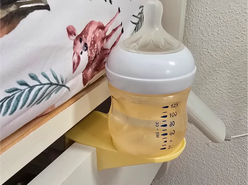 Baby bottle holder for bed